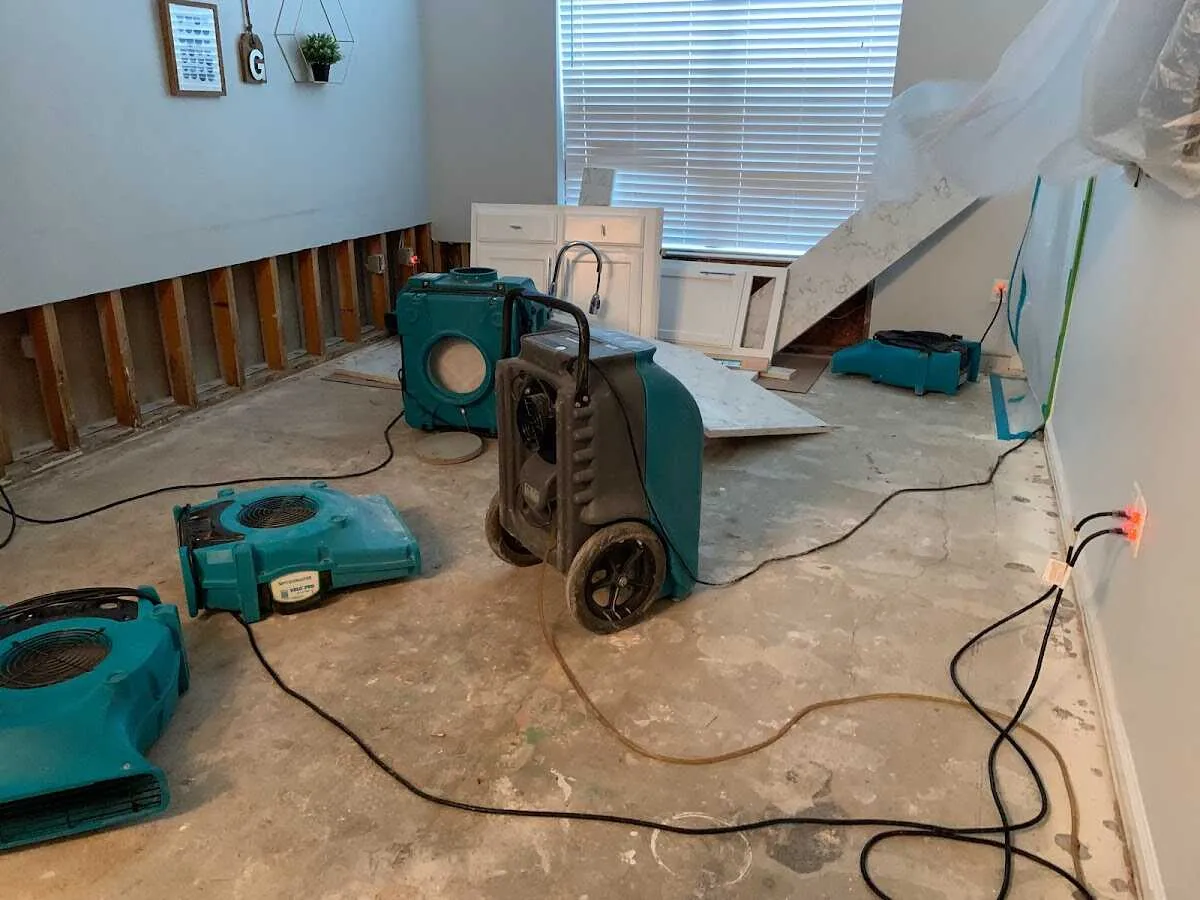 Dehumidifier in flood-cut room for Water Damage Restoration in Childress